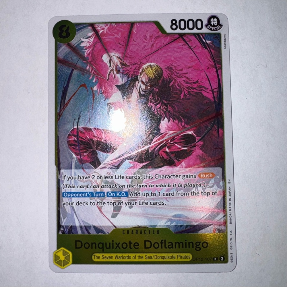 Donquixote Doflamingo OP12-107 English R Legacy Master One Piece Card Game